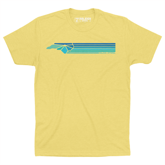 Banana cream colored t-shirt with Raleigh Apparel logo in cool colors followed by colorways across the chest.