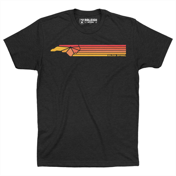 Black t-shirt with Raleigh Apparel logo in warm colors followed by colorways across the chest.