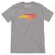 Heather gray colored t-shirt with Raleigh Apparel logo on chest in warm colors. 