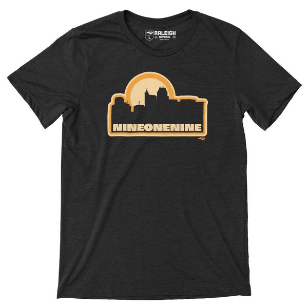 Black t-shirt with outline of Raleigh skyline in yellow, with nine one nine written in yellow under skyline.