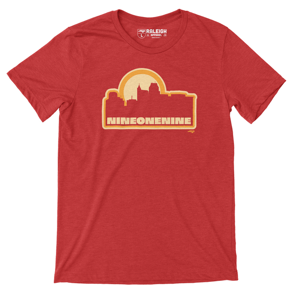 Red t-shirt with outline of Raleigh skyline in yellow, with nine one nine written in yellow under skyline.