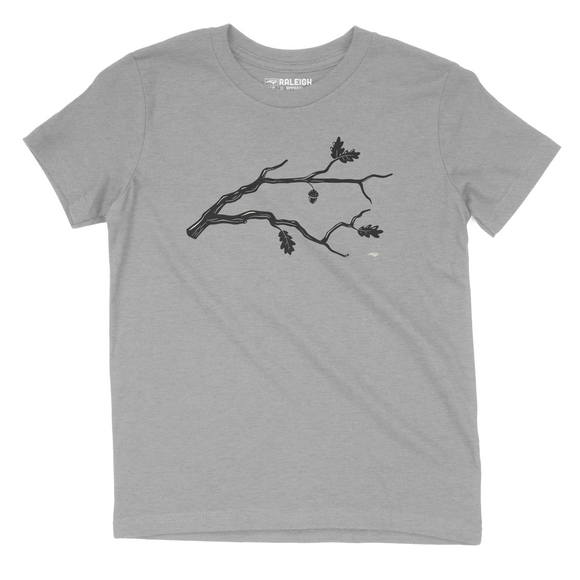 Youth t-shirt in athletic Heather gray with state of North Carolina shaped out of a branches with an acorn hanging over Raleigh.