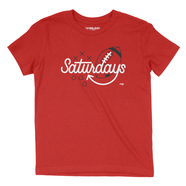 Heather red youth t-shirt with the word Saturdays in white and black football behind the letters  D A Y S