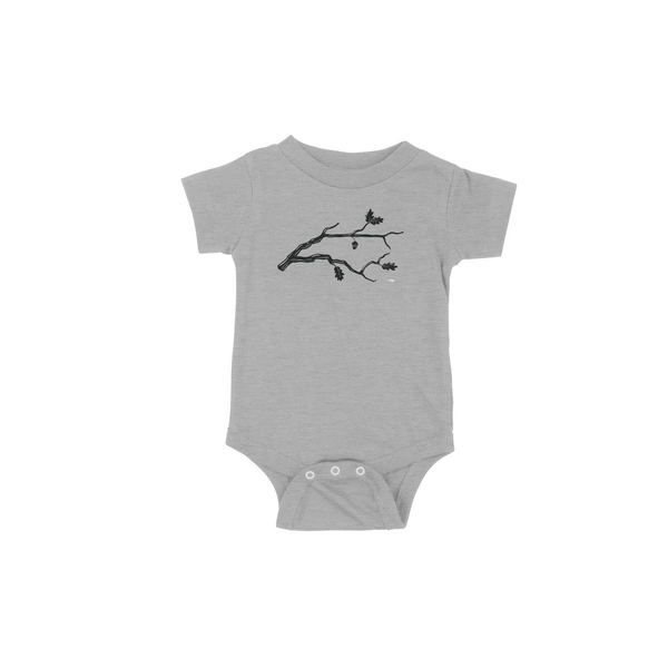 Grey childs onesie with oak tree branch in the shape of state of North Carolina with acorn hanging over Raleigh.